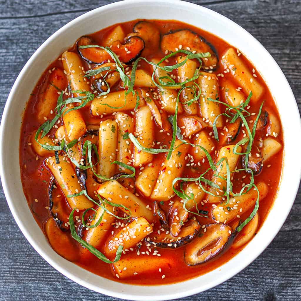Authentic Tteokbokki Recipe of Spicy Rice Cakes Made Easy | Bite N Sip